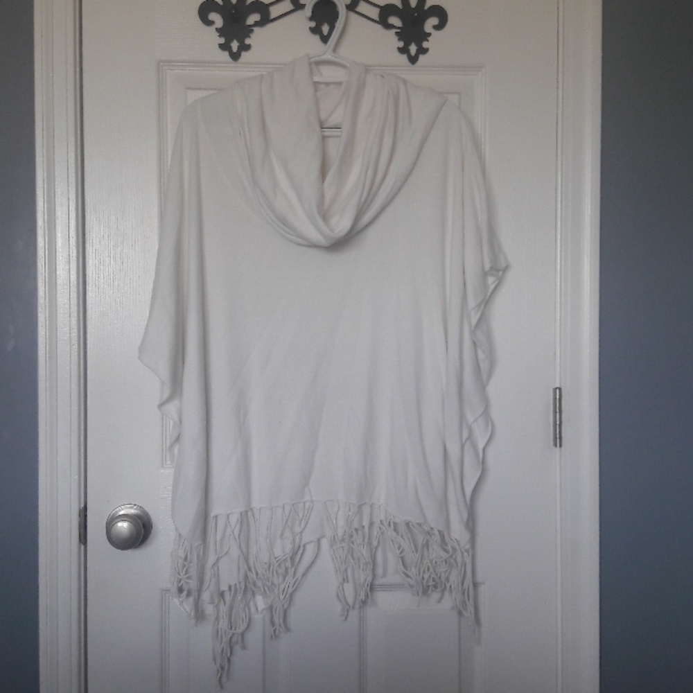 White poncho sweater